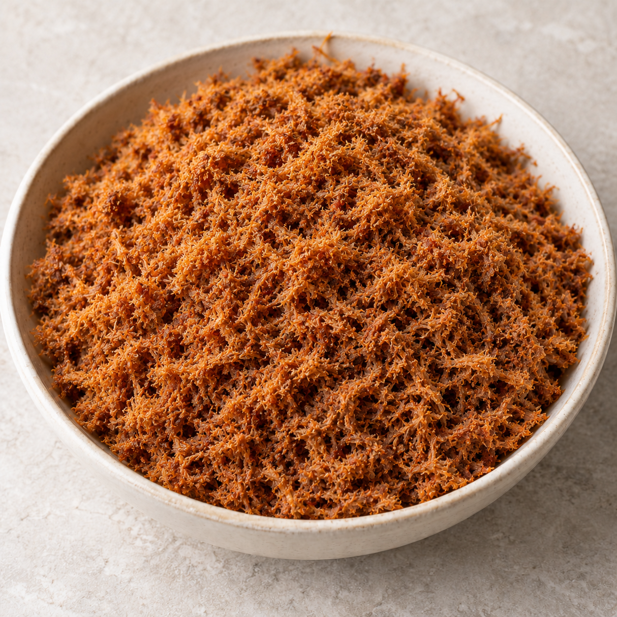 : Loose fine strands of seasoned dambu nama beef