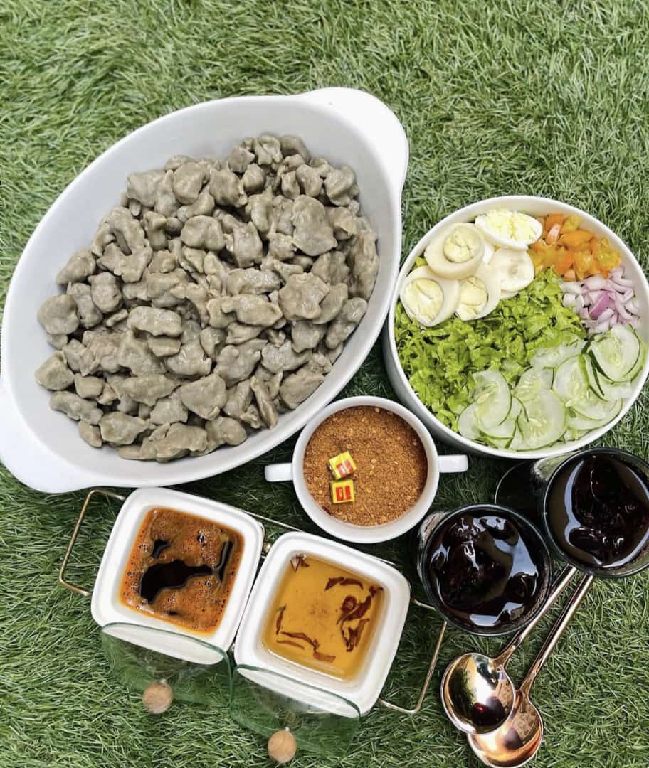 Dan wake dumplings with separate vegetables, eggs and condiments